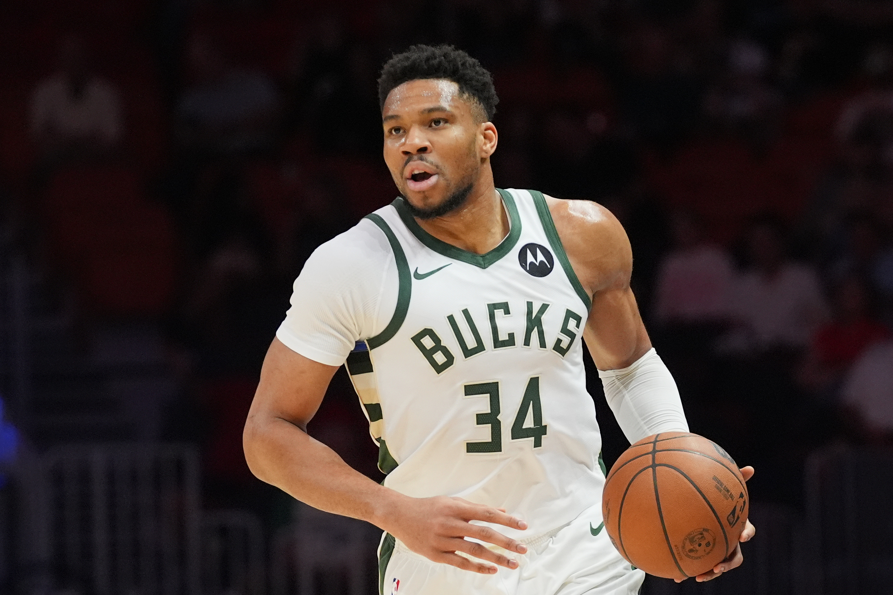 FILE - Milwaukee Bucks forward Giannis Antetokounmpo (34) dribbles the ball during the first half of an NBA basketball game against the Miami Heat, March 12, 2026, in Miami.