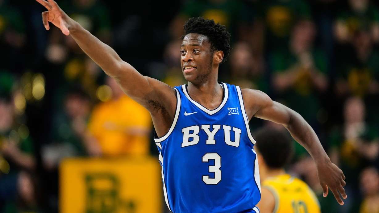 FILE - BYU forward AJ Dybantsa celebrates his three-pointer in the second half of an NCAA college basketball game against Baylor, Feb. 10, 2026, in Waco, Texas.
