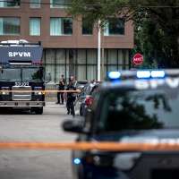Officer among 2 killed in a Montreal shooting that sources say appeared to target police