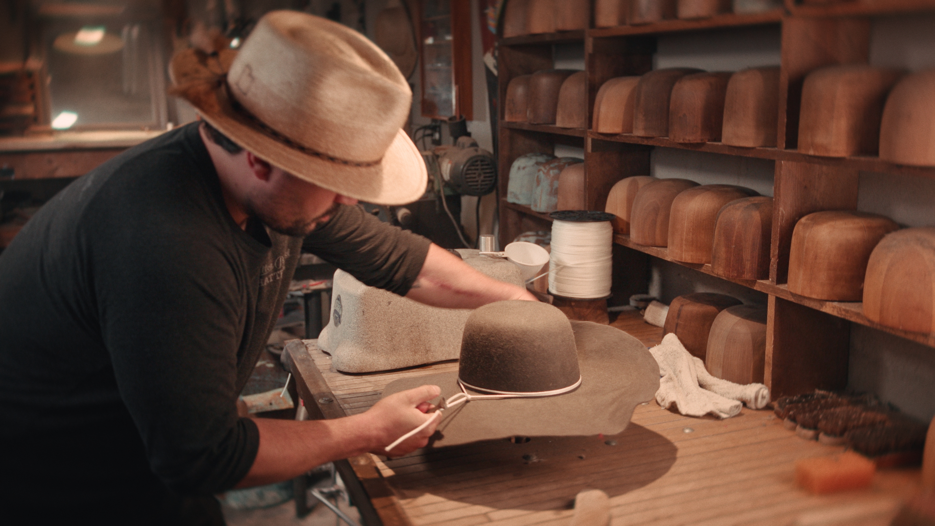 Inside a hat maker's shop: Handmade hats crafted with vintage equipment