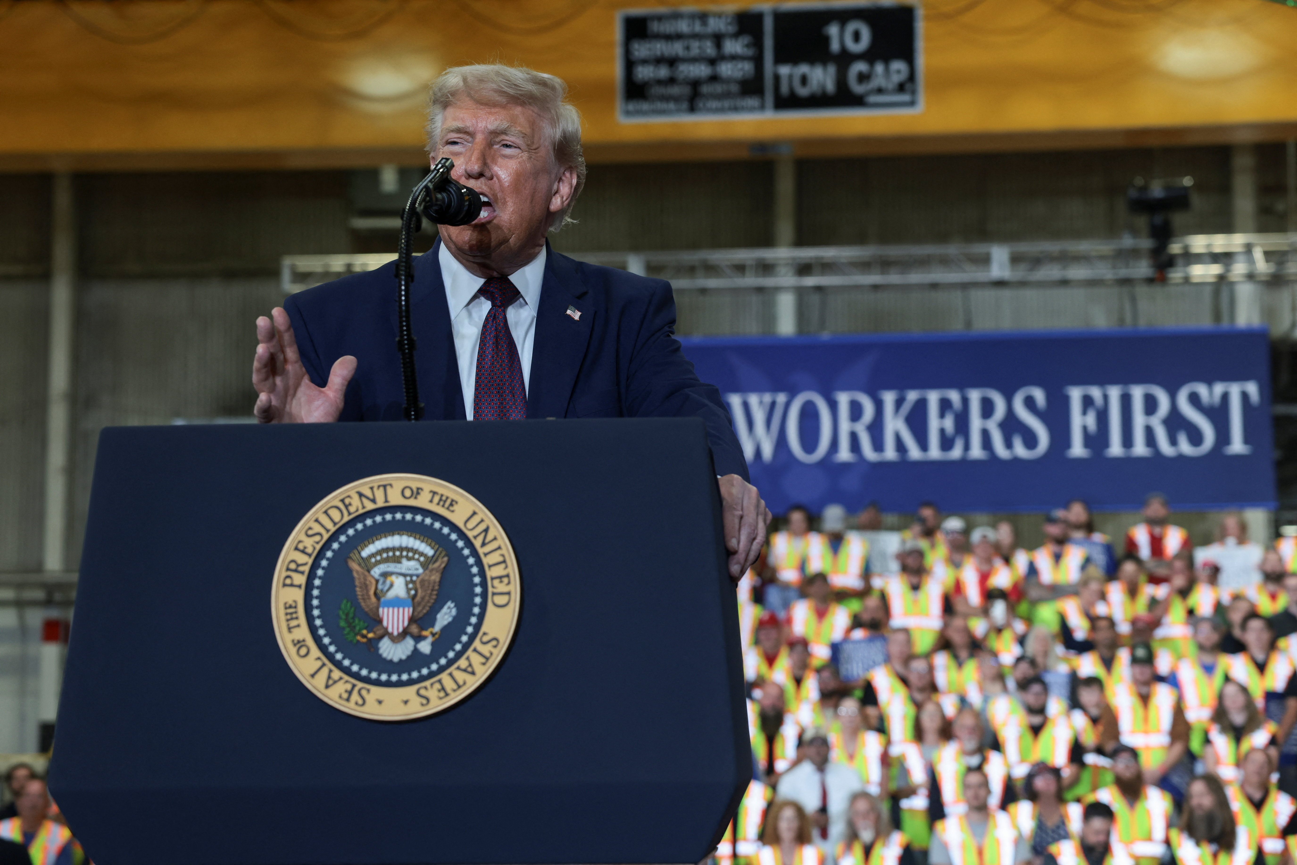 President Donald Trump delivers remarks during a visit to a Mack Trucks assembly plant, in Macungie, Pa., Tuesday. Trump returned to the campaign trail for the first time in two weeks to pitch his revival of the Rust Belt to voters.