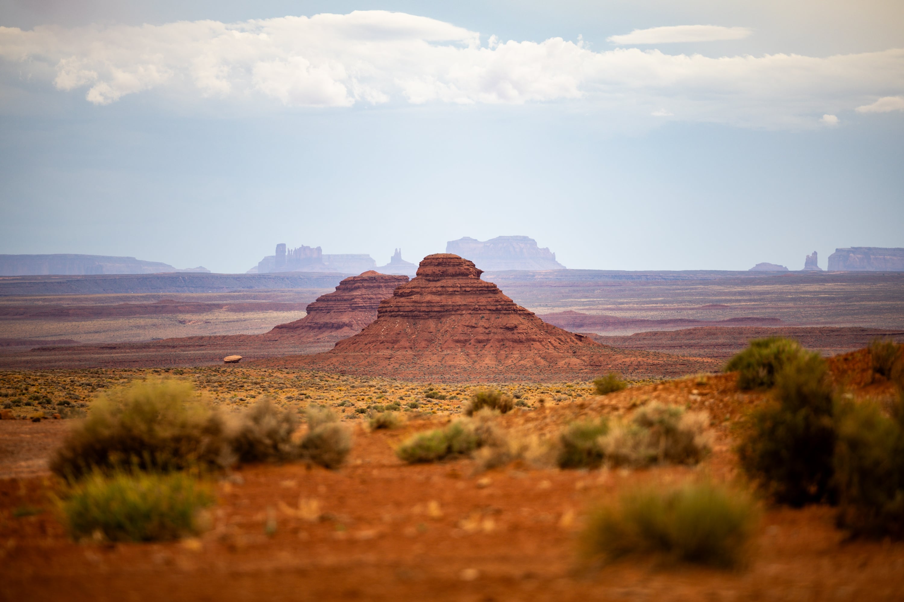 Buttes tower over sagebrush in the Valley of Gods at Bears Ears National Monument on June 3, 2025.