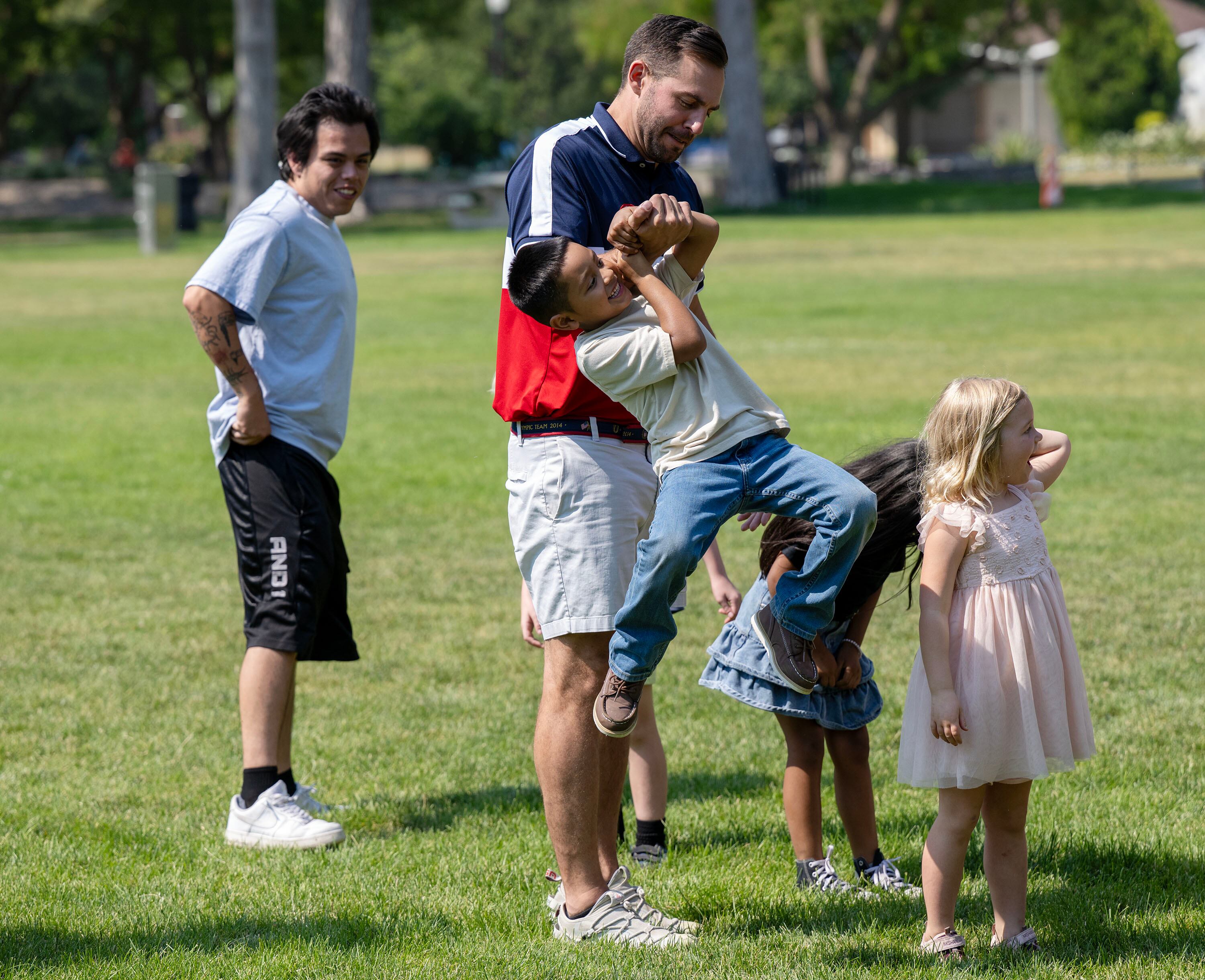 Jacob joins Olympic and Paralympic athletes from the 2026 Milan Cortina Winter Games in celebrating global Olympic Day with a morning of workouts with other kids at Salt Lake City’s YouthCity program at Liberty Park in Salt Lake City on Tuesday.