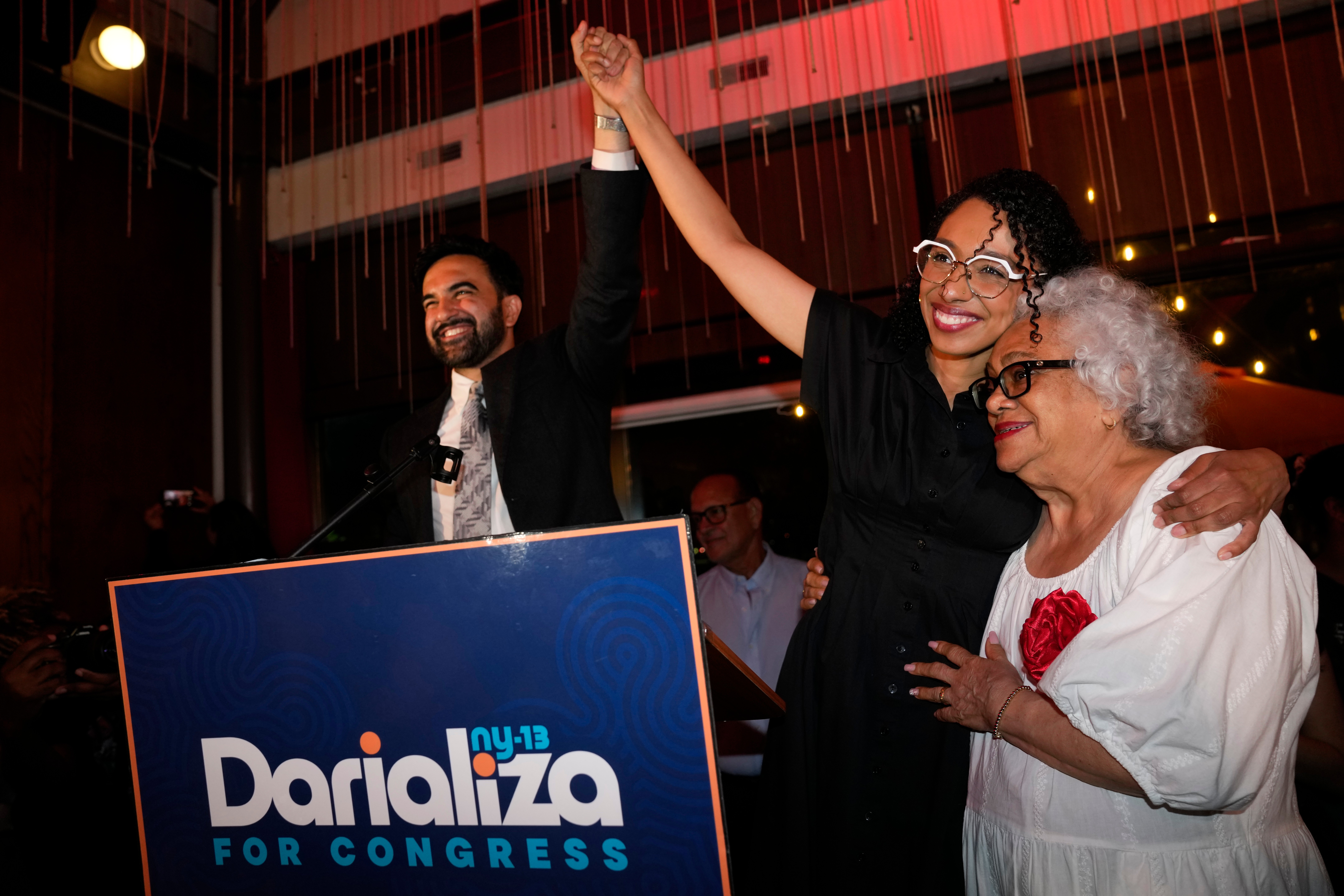 New York City Mayor Zohran Mamdani celebrates with Democratic congressional candidate Darializa Avila Chevalier and organizer Carmen Rojas during an election night watch party Tuesday in New York. The primary elections in New York raised new questions about the future of the Democratic Party.