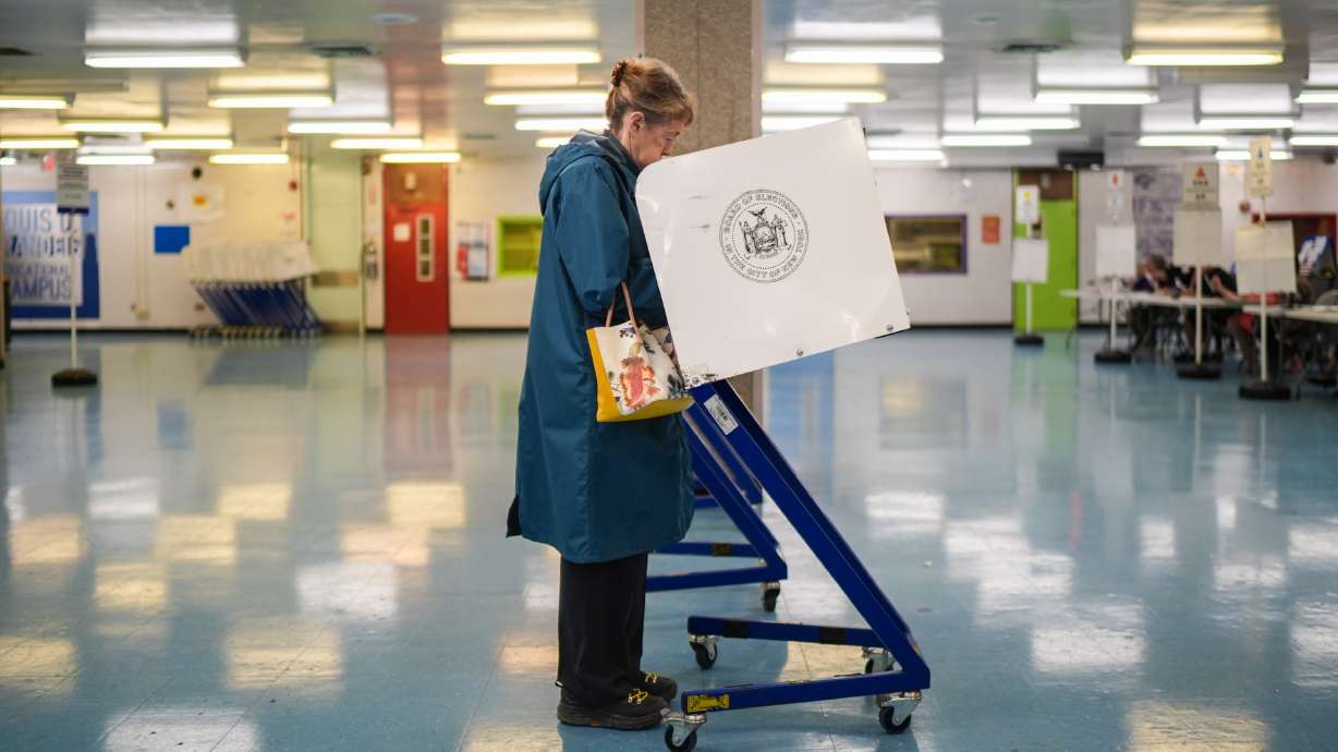 A voter casts a ballot during New York’s primary election on Tuesday in New York.