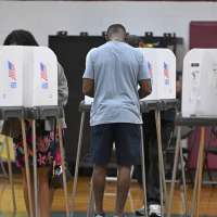 Federal judge bars Trump from implementing proof of citizenship requirement to vote