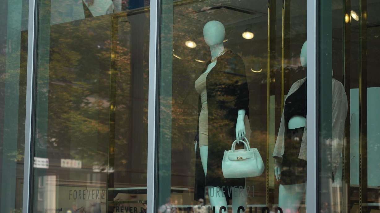 A window at City Creek Mall on Aug. 8, 2021. As buyers hunt for deals and skip full-price goods, retailers may face surpluses now, then cut future orders, setting the stage for possible shortages later.