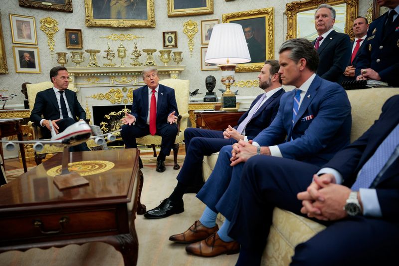 President Donald Trump participates in a meeting with NATO Secretary General Mark Rutte, Vice President JD Vance and Secretary of Defense Pete Hegseth in the Oval Office at the White House in Washington, D.C., Wednesday.