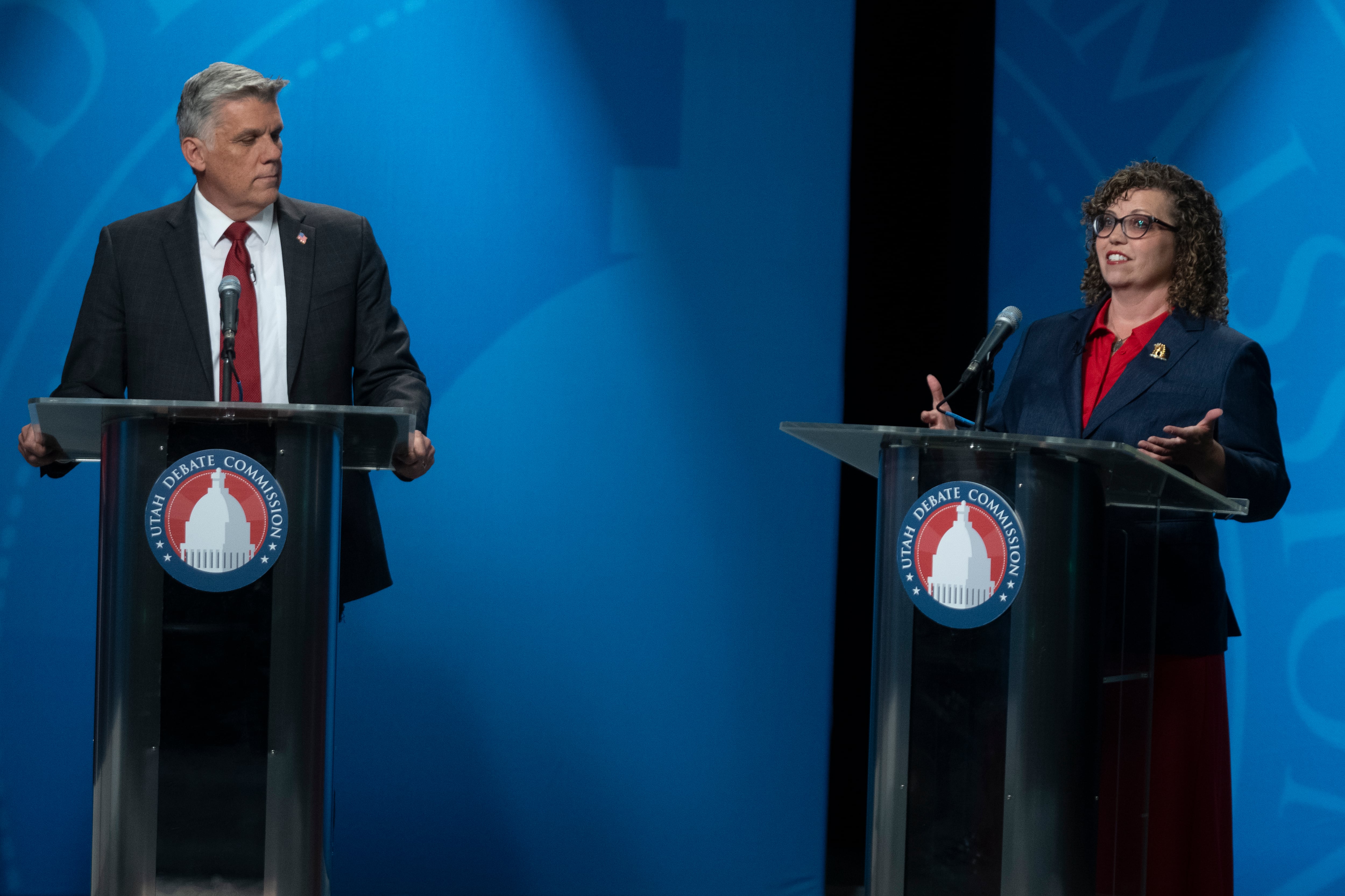 Phil Lyman watches as Celeste Maloy speaks during the 3rd Congressional District GOP primary debate in Salt Lake City on June 1. Maloy faced a stiff challenge from Lyman, who benefited on the campaign trail from name recognition.