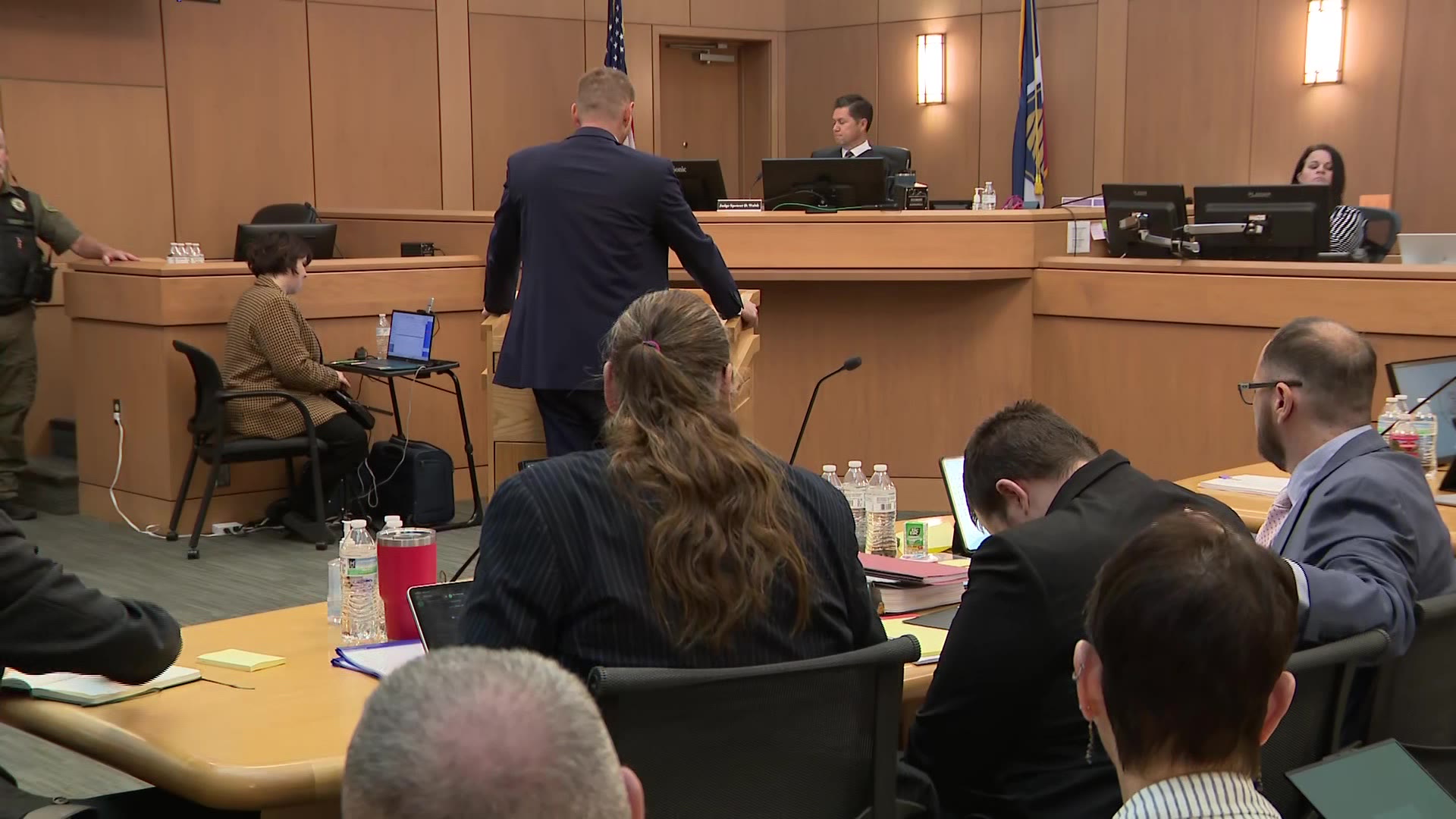Defense attorneys Mary Corporon and Jonathan Nish sit next to Ryan Bate, the man accused of killing two Tremonton cops, while prosecutor Blair Wardle speaks during a preliminary hearing on Wednesday.
