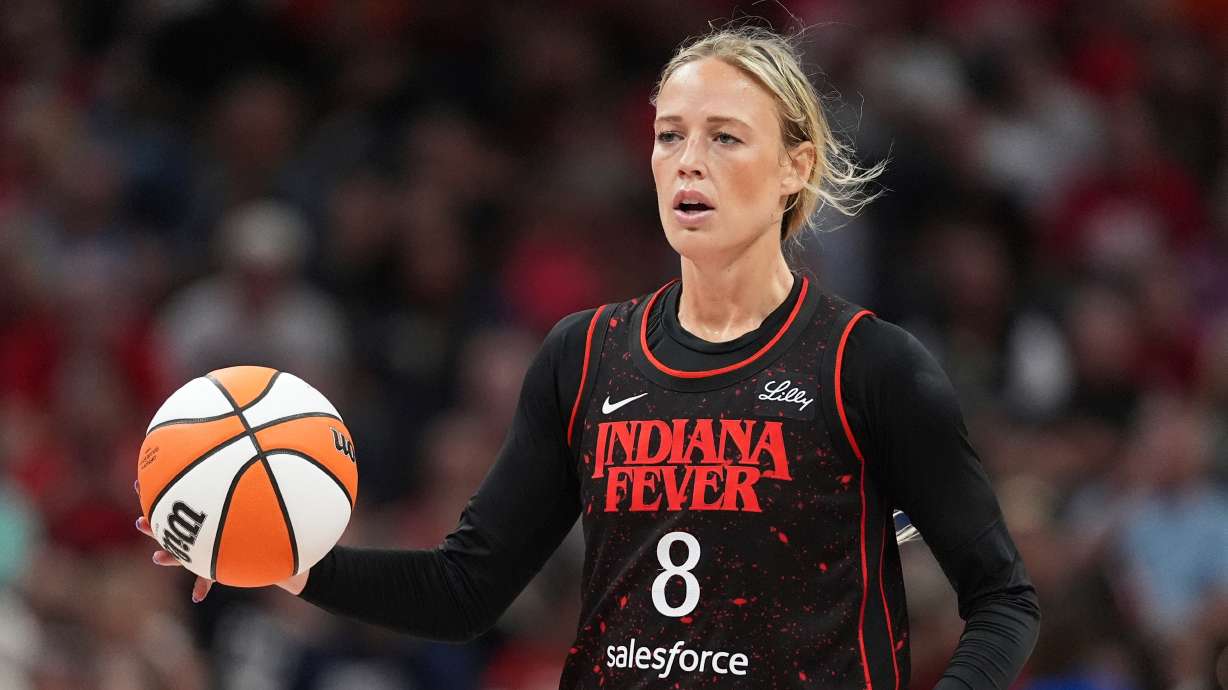FILE - Indiana Fever guard Sophie Cunningham (8) plays against the Dallas Wings in the second half of a WNBA basketball game in Indianapolis, Aug. 12, 2025.
