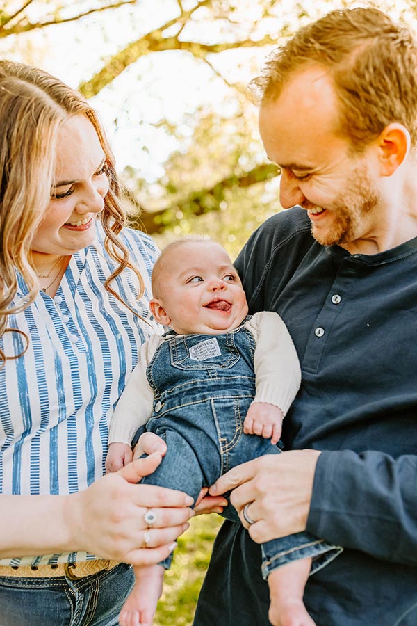 Logan and his parents are pictured.