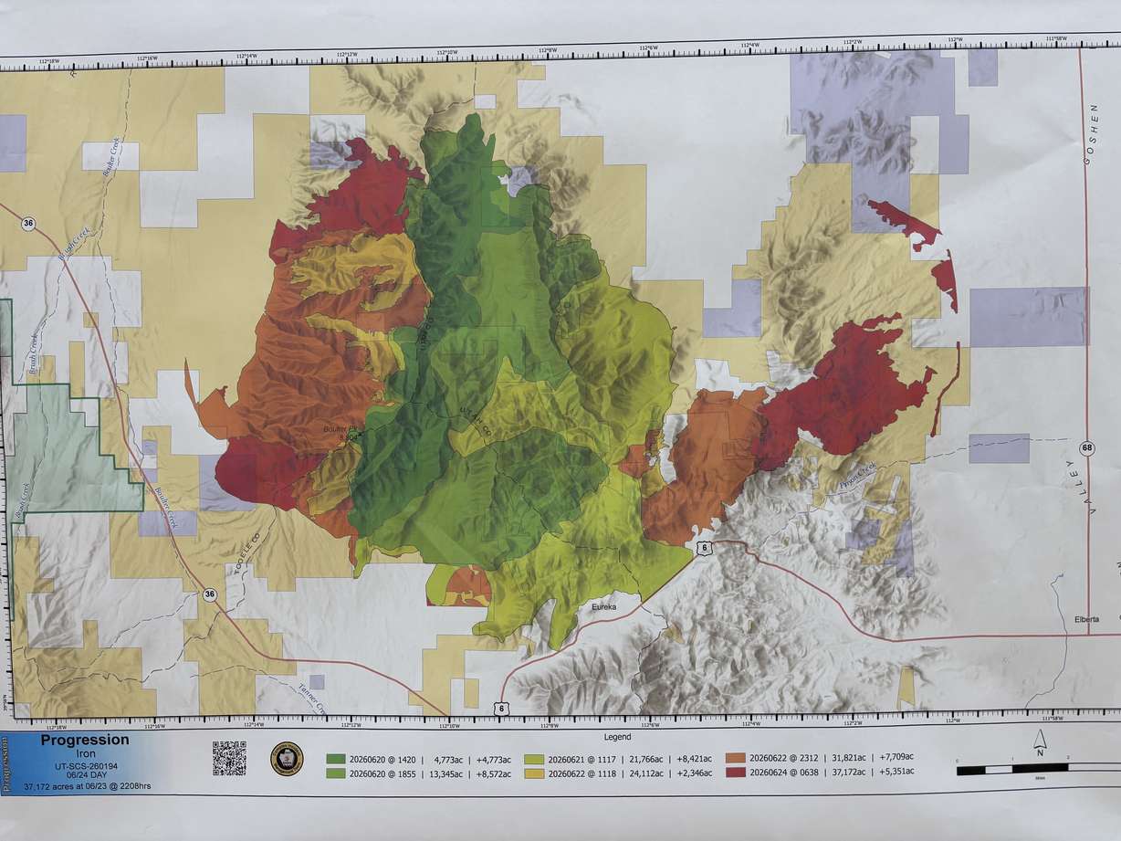 Burn areas for the region of the Iron Fire are shown on a map at a community meeting Wednesday.