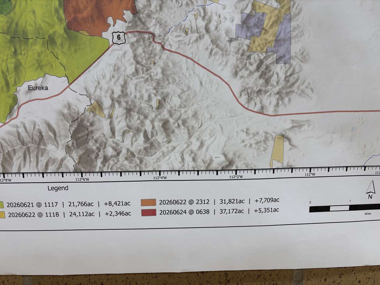 Burn areas for the region of the Iron Fire are shown on a map at a community meeting Wednesday.