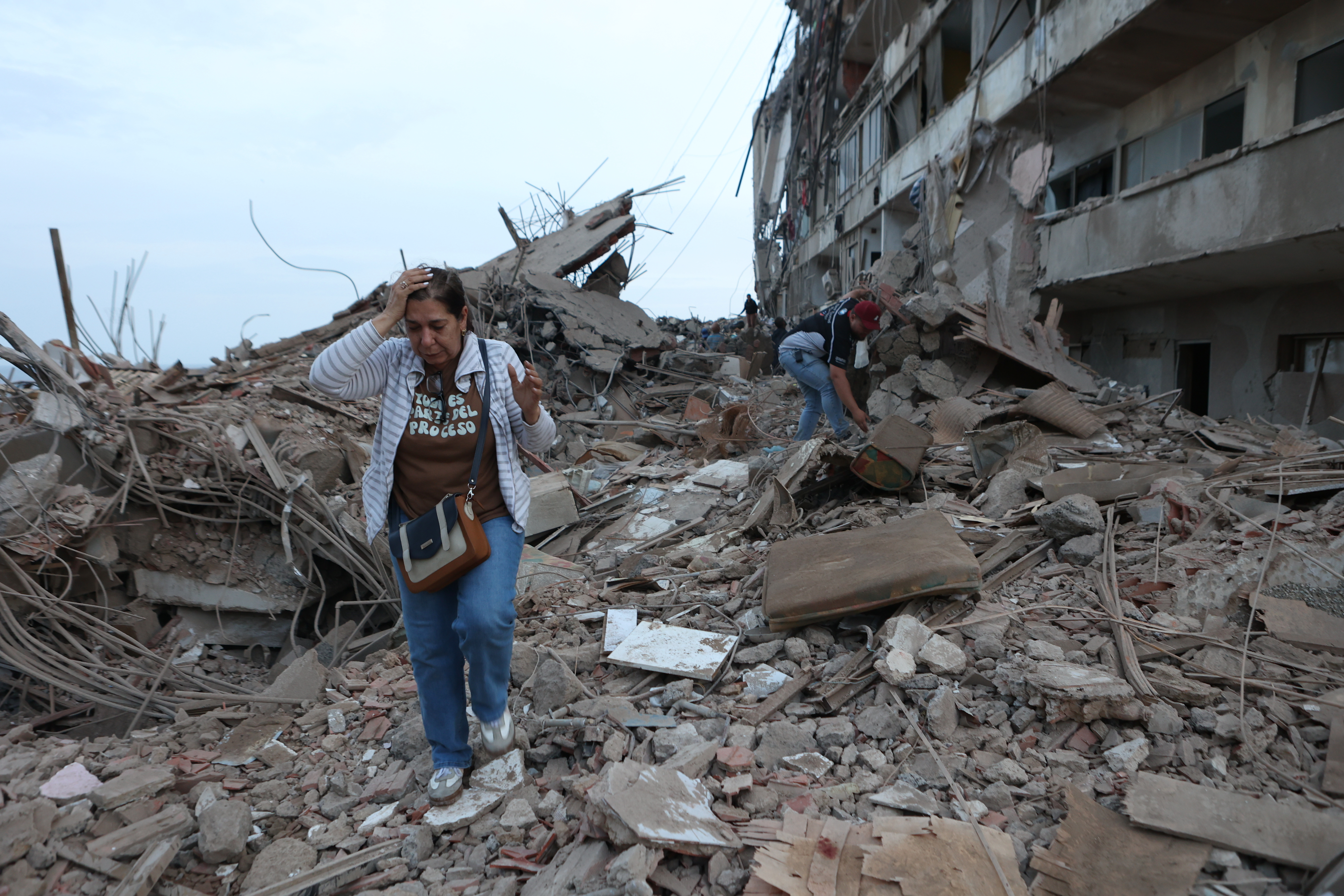 At least 164 dead and 971 injured after powerful quakes rock Venezuela, acting president says