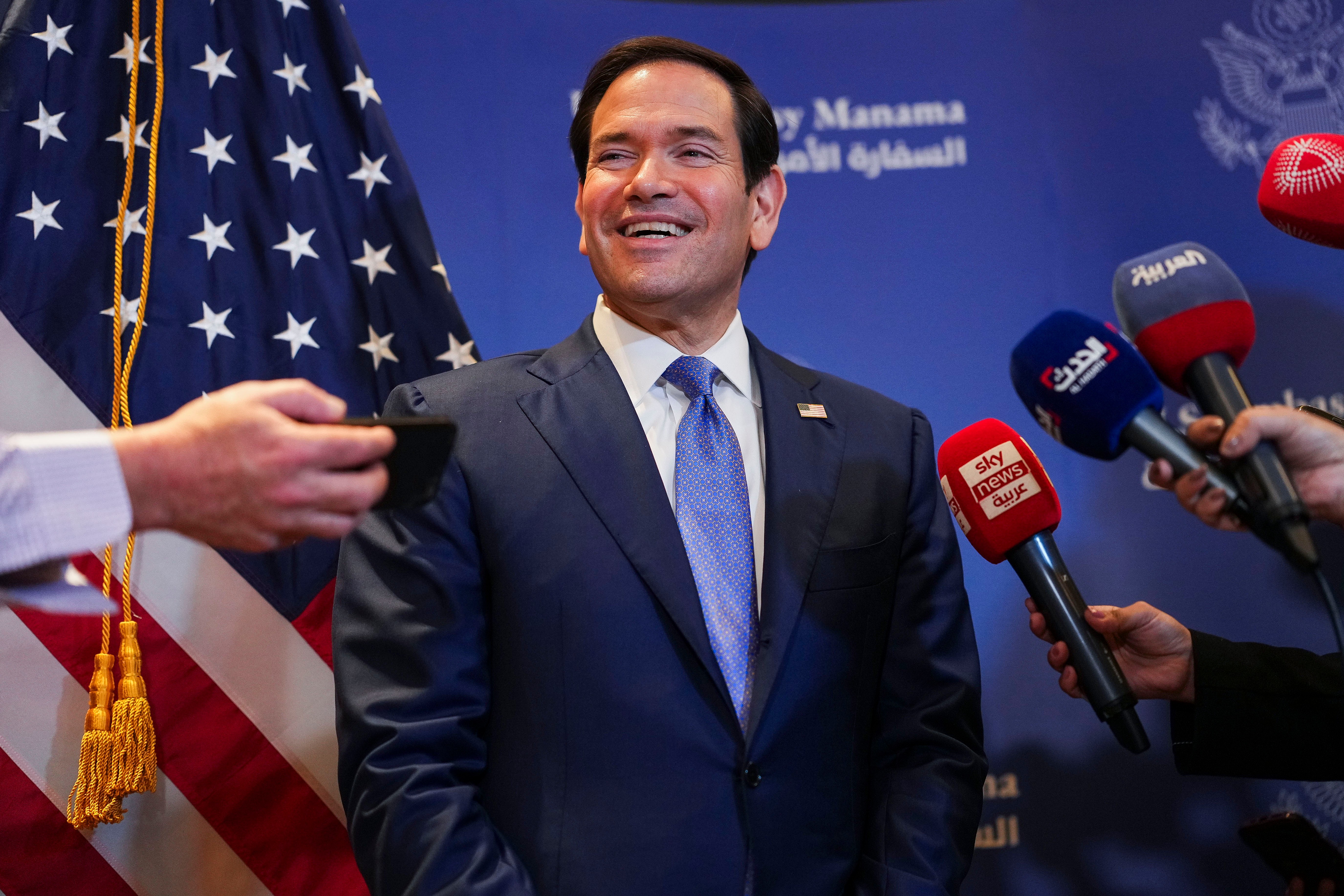 Secretary of State Marco Rubio speaks with members of the media before departing for Bahrain International Airport after his visit to the Middle East, in Manama, Thursday. Rubio said the U.S. response to the earthquakes in Venezuela would be "big," "fast" and "effective."