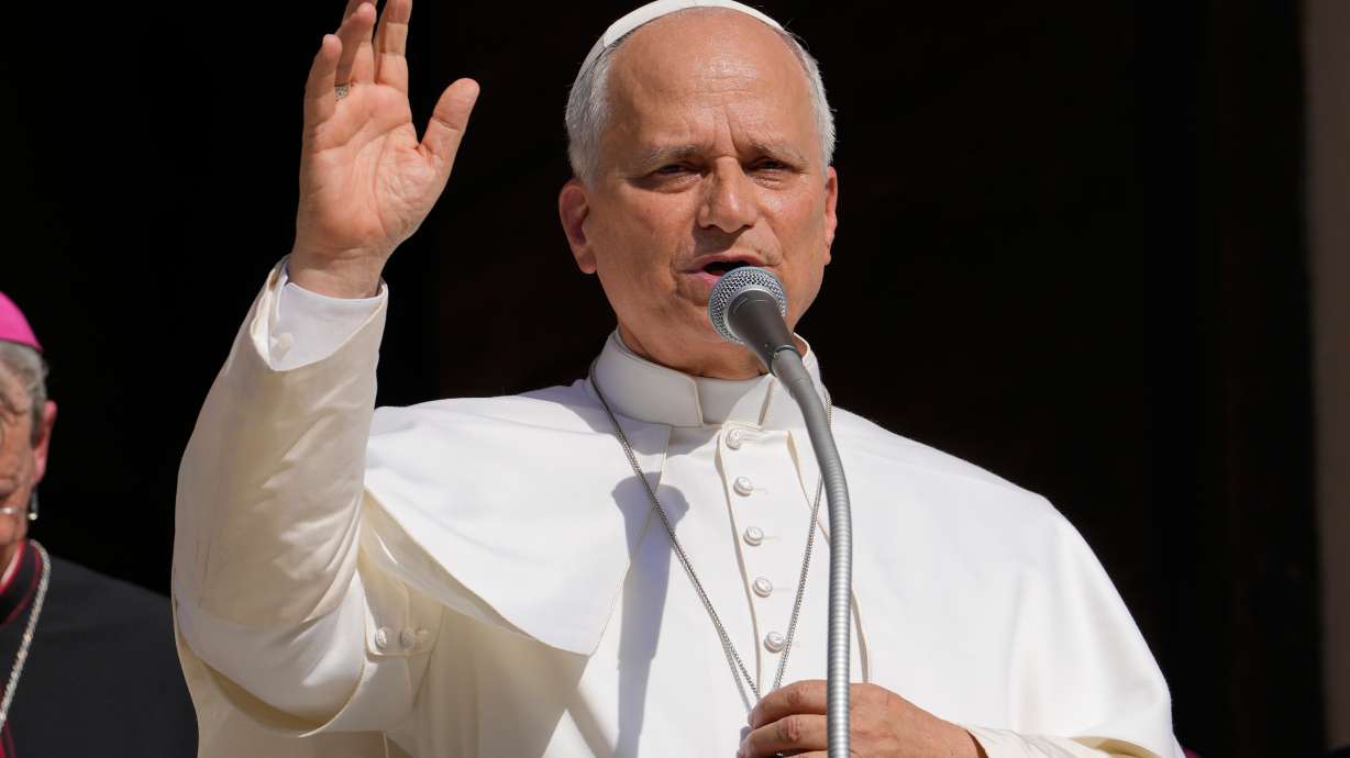 FILE - Pope Leo XIV delivers his blessing as he visits Pavia's Cathedral, northern Italy, on June 20, 2026.