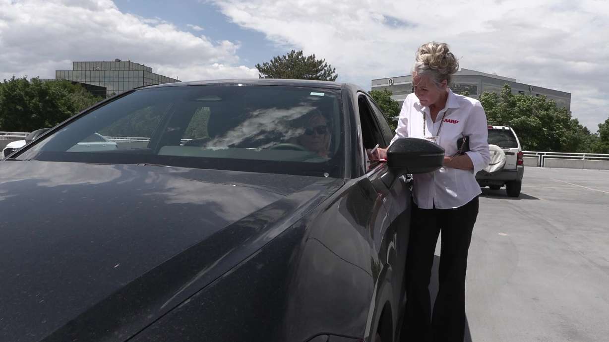 CarFit instructor Paulette Welch inspects a car. Most of us buckle up and hit the road without a second thought. But are you actually fit for your car? There's a free program helping Utah drivers find out, and the answers might surprise you.
