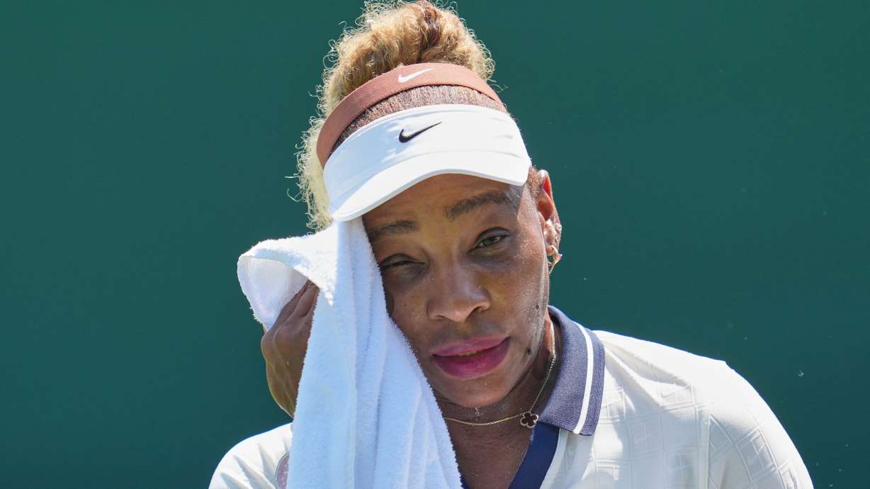 Serena Williams of the United States wipes sweat during a practice session ahead of the Wimbledon Tennis Championships, in London, Wednesday, June 24, 2026.