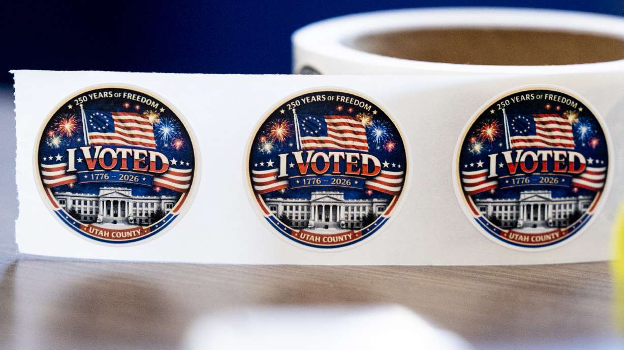 Stickers for Utah County voters sit on a table as part of Utah’s primary election at the Lehi Civic Center on Tuesday.