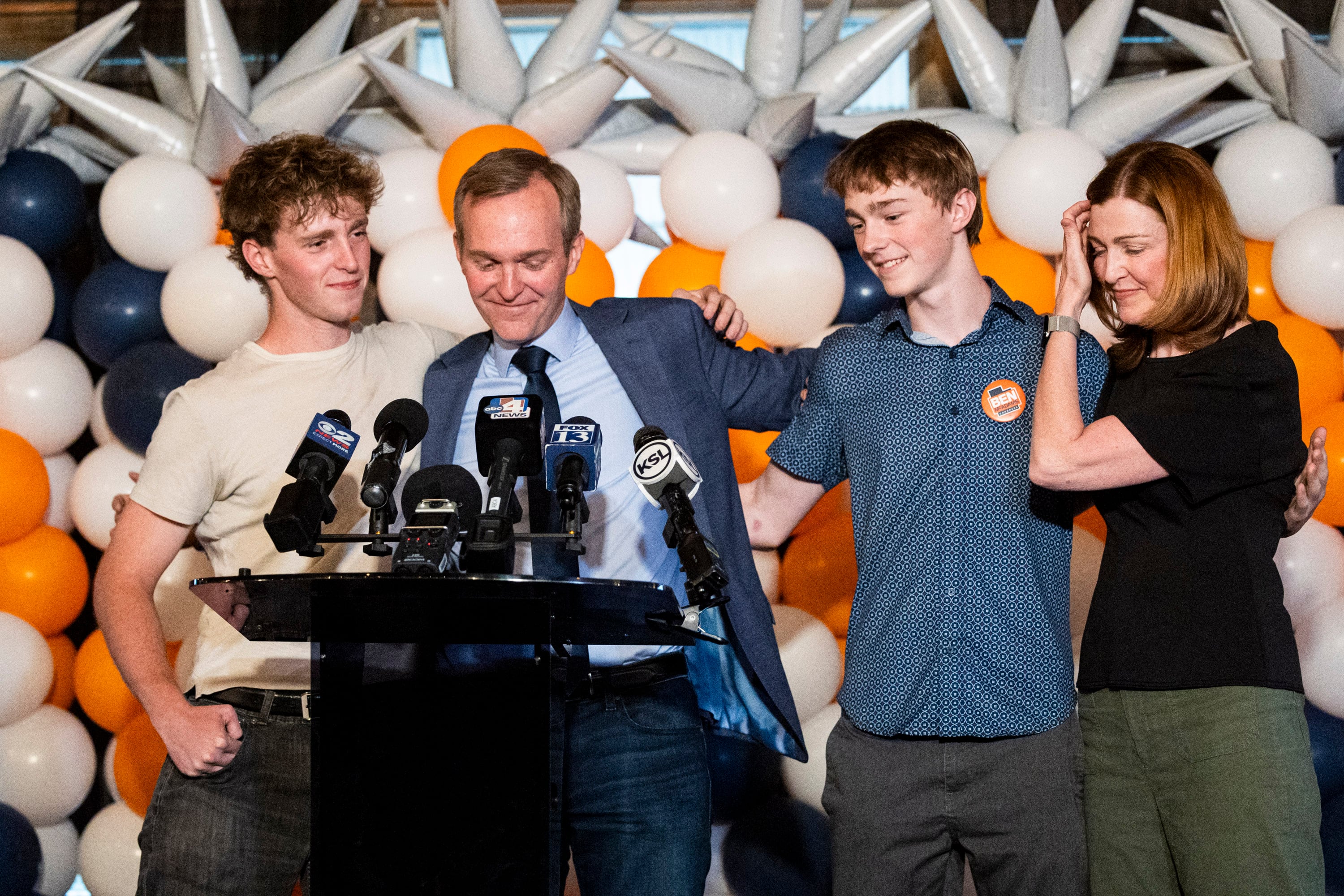 Ben McAdams, a candidate for Utah's 1st Congressional District, hugs his family during a watch party on primary election night at Publik Coffee Roasters in Salt Lake City on Tuesday. McAdams defeated several progressive challengers in the primary by a healthy margin.