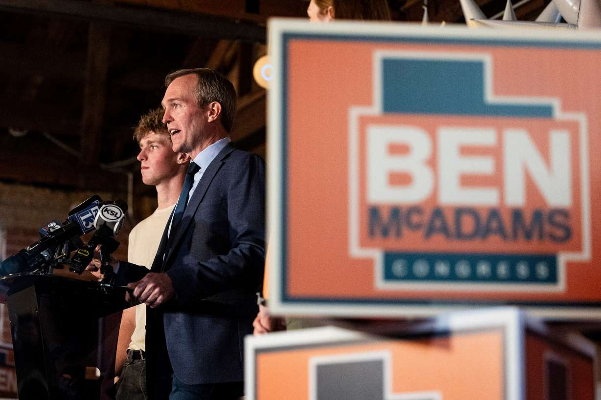 Ben McAdams, a candidate for Utah's 1st Congressional District, speaks while joined by part of his family during a watch party on primary election night at Publik Coffee Roasters in Salt Lake City on Tuesday. McAdams said there's more urgency than when he was first elected to the House in 2018.