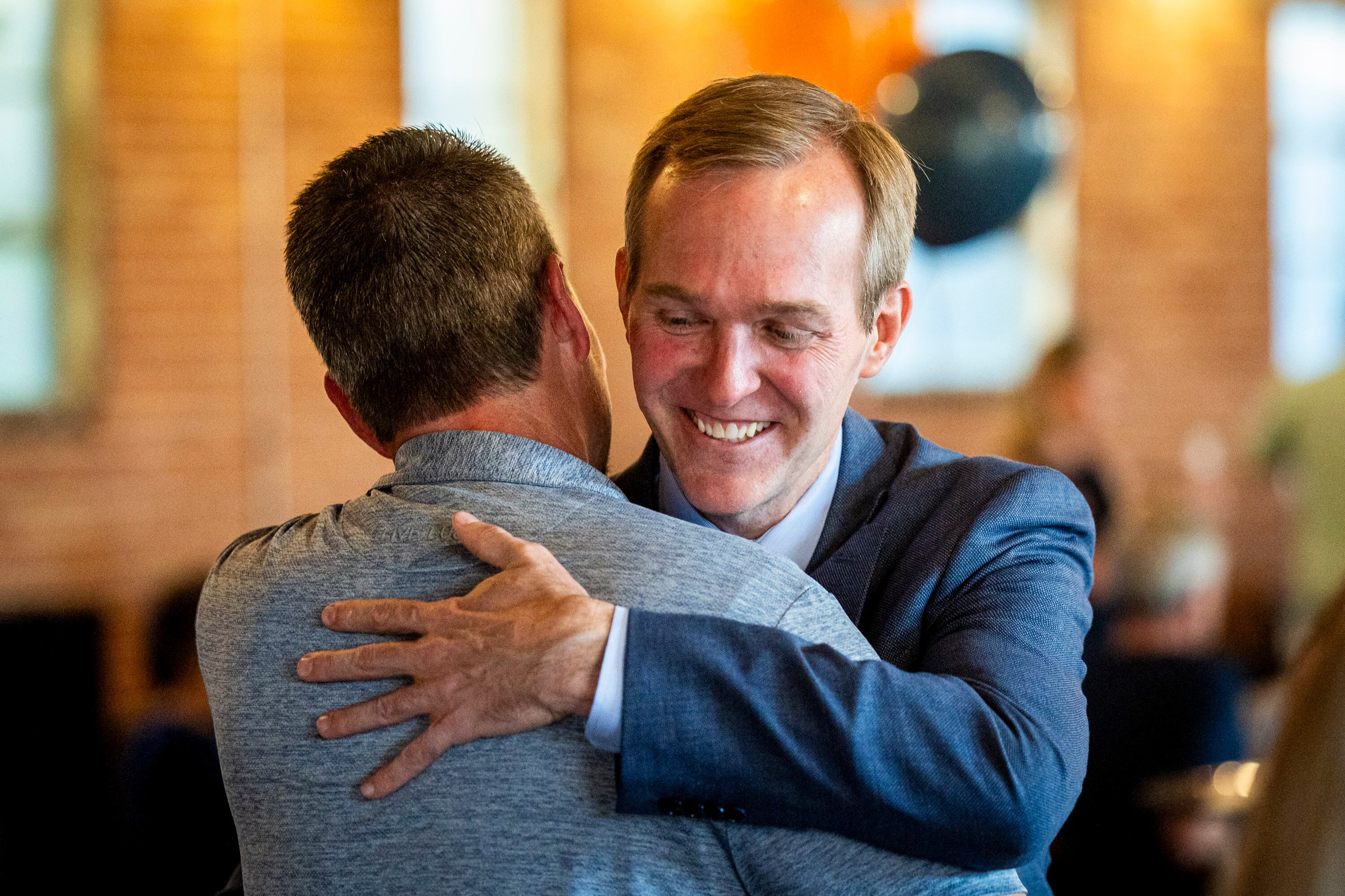 Ben McAdams, a candidate for Utah's 1st Congressional District, hugs an attendee during a watch party on primary election night at Publik Coffee Roasters in Salt Lake City on Tuesday. McAdams defeated several progressive challengers in the primary by a healthy margin.
