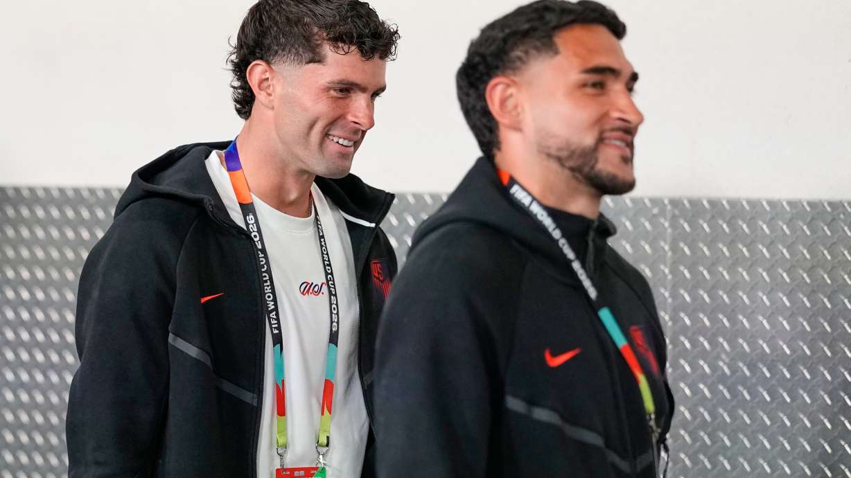 United States' Christian Pulisic, left, and teammate Cristian Roldan arrive at the stadium ahead of the World Cup Group D soccer match between Turkey and the United States in Inglewood, Calif., near Los Angeles, Thursday, June 25, 2026.