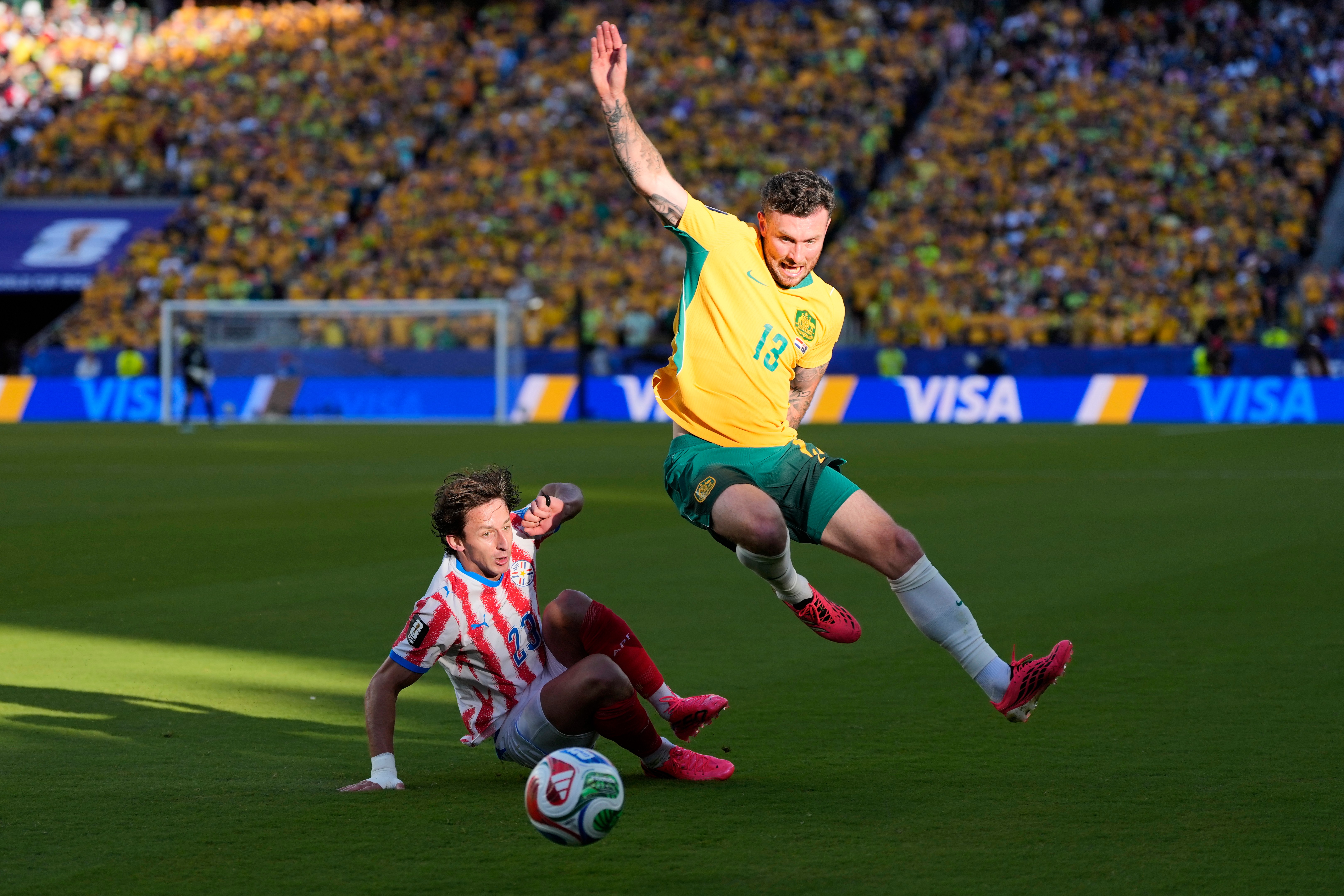 Australia clinches knockout round spot with 0-0 draw; Paraguay also likely to advance