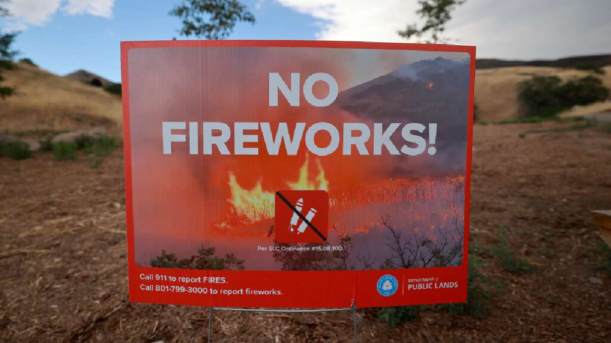 A "no fireworks" sign is pictured near Popperton Park in Salt Lake City on June 25. Cities throughout Utah are announcing their decisions on whether residents can light fireworks in city boundaries and giving limitations on where fireworks can be lit for Pioneer Day.