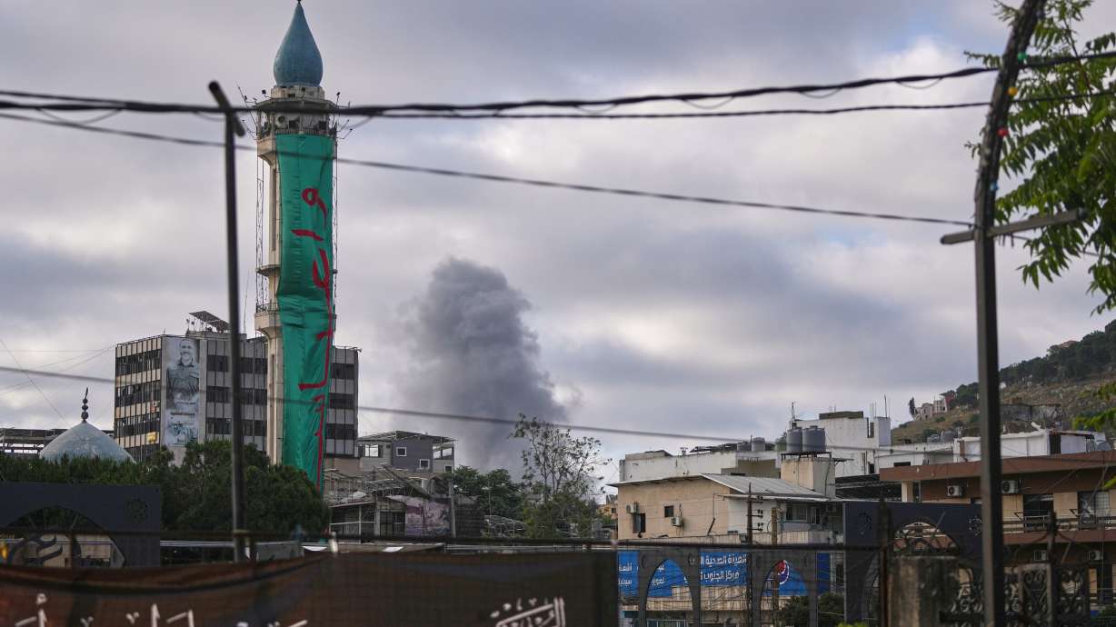 Smoke rises from the site of an Israeli airstrike on the outskirts of Nabatiyeh during Ashoura, in southern Lebanon, Friday. Shiite Muslims commemorated the holiday amid the backdrop of the Iran war.