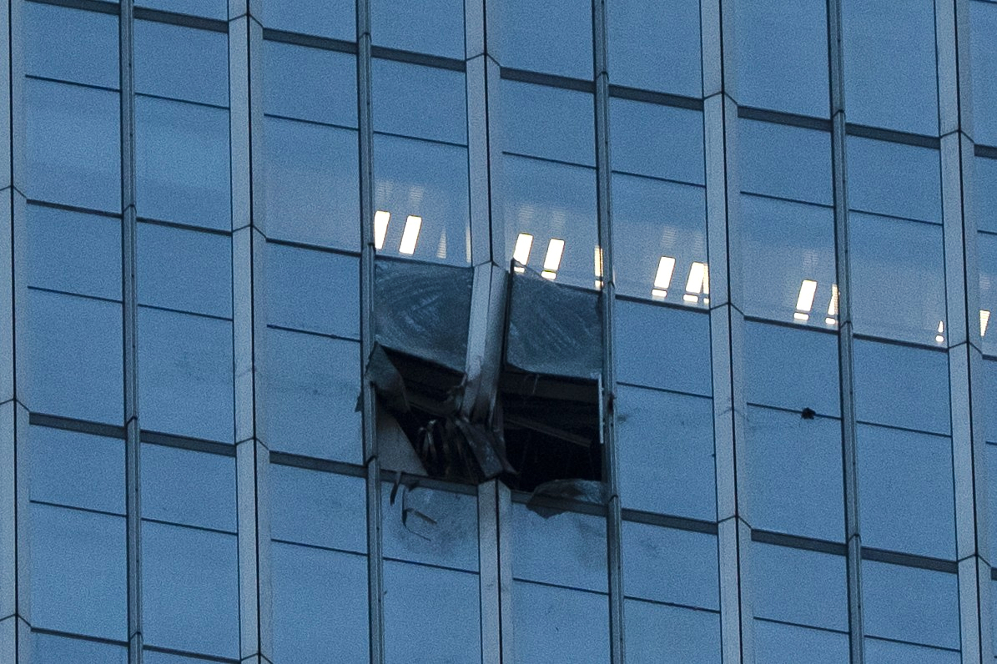 Small aircraft crashes into Beijing's tallest building, eyewitnesses say