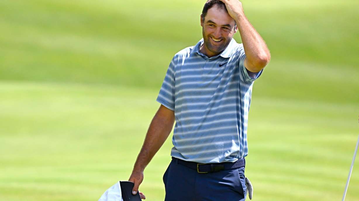 Scottie Scheffler reacts after finishing the second round of the Travelers Championship golf tournament at TPC River Highlands, Friday, June 26, 2026, in Cromwell, Conn.
