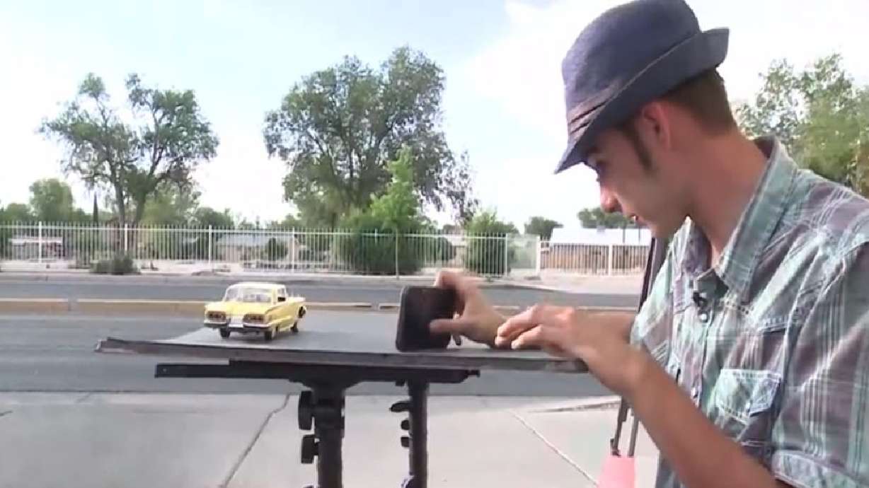 Anthony Schmidt, an 18-year-old photographer with autism, is traveling Route 66 with his mom, capturing the centennial celebration through forced perspective photography of model cars.