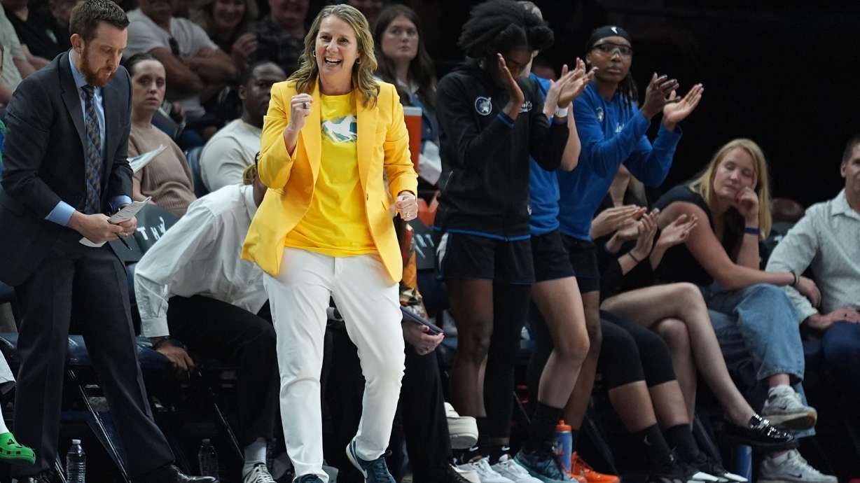 Minnesota Lynx head coach Cheryl Reeve, middle, celebrates during the second half of a WNBA basketball game against the Atlanta Dream Wednesday, May 27, 2026, in Minneapolis.