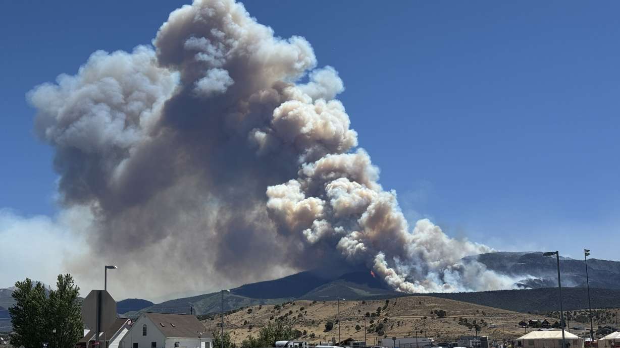 The Cottonwood Fire burning in southern Utah on Friday. An estimated 150 buildings have been destroyed in the fire.