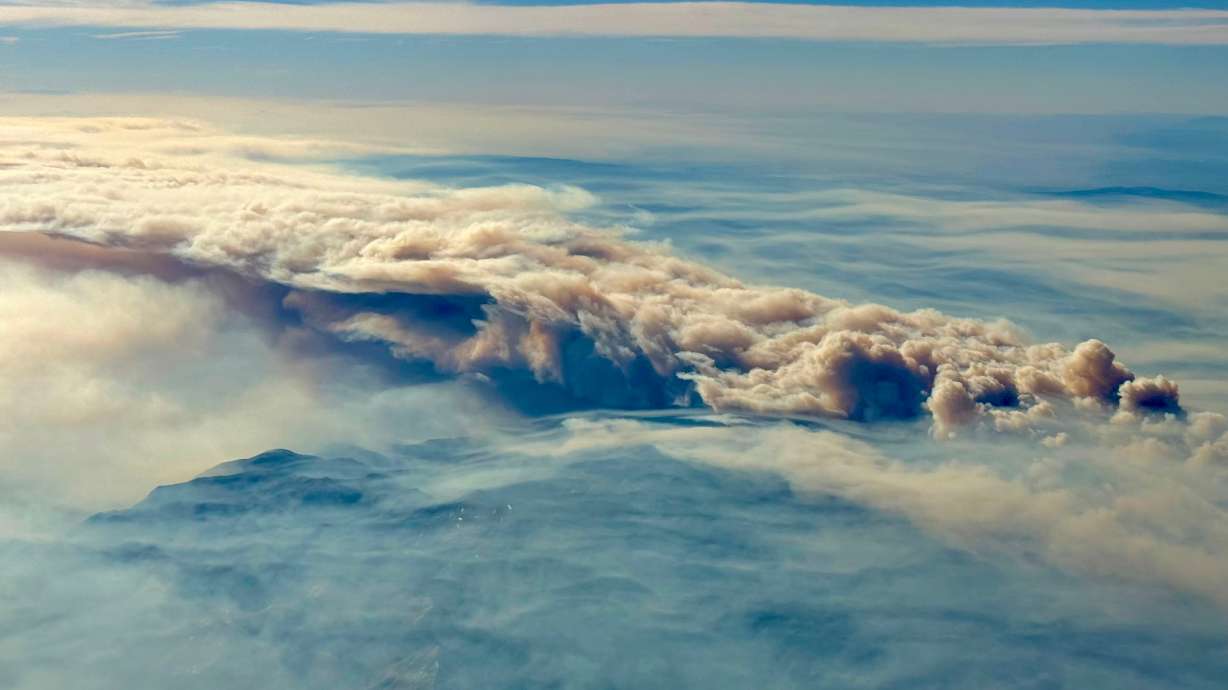 The Cottonwood Fire is visible from a passing passenger plane, June 23.