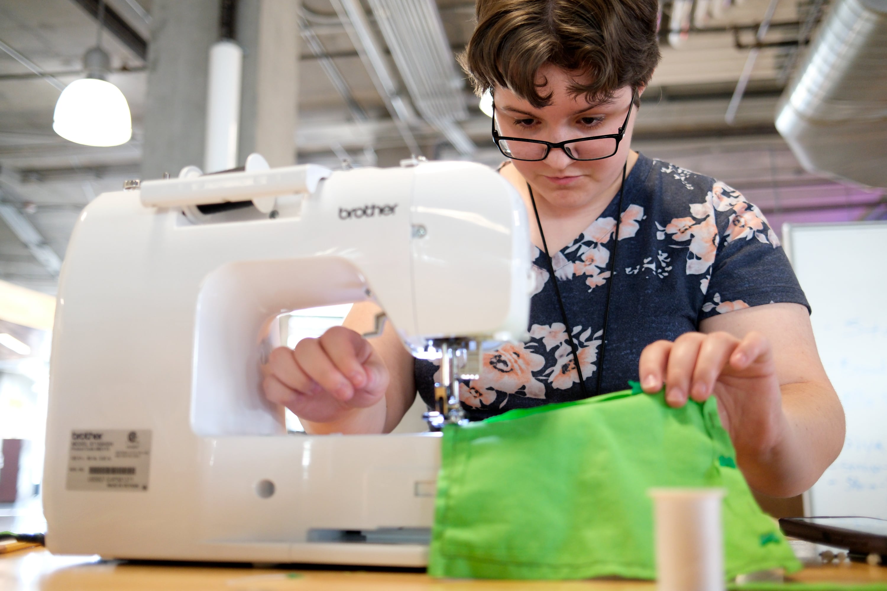 Brooklyn Thomas, 16, of Tooele, sews an apron for a restaurant she hopes to open at Lassonde Startup Academy at the University of Utah’s Lassonde Studios in Salt Lake City on Monday. A Stanford business professor said U. students have the greatest odds to create "unicorn" businesses.