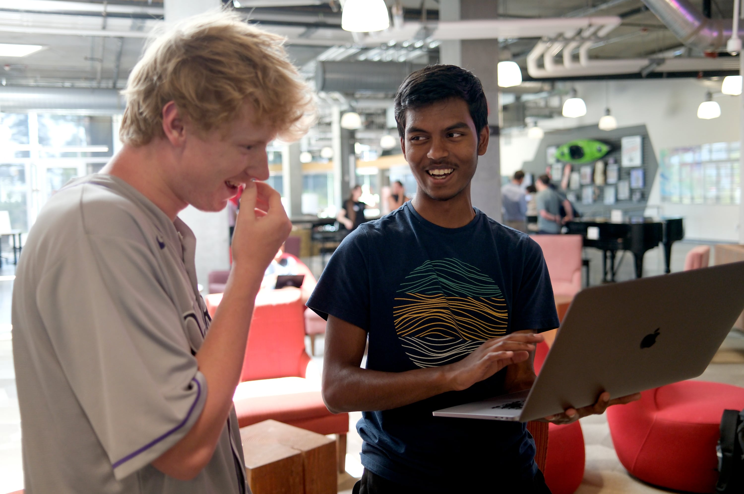 Cooper Marshall, teaching assistant, helps Sashwath Narayana, 17, of Herriman, with CAD design of interchangeable footwear soles during Lassonde Startup Academy at the University of Utah’s Lassonde Studios in Salt Lake City on Monday. Many have taken their maiden steps into creating their own businesses at Lassonde.