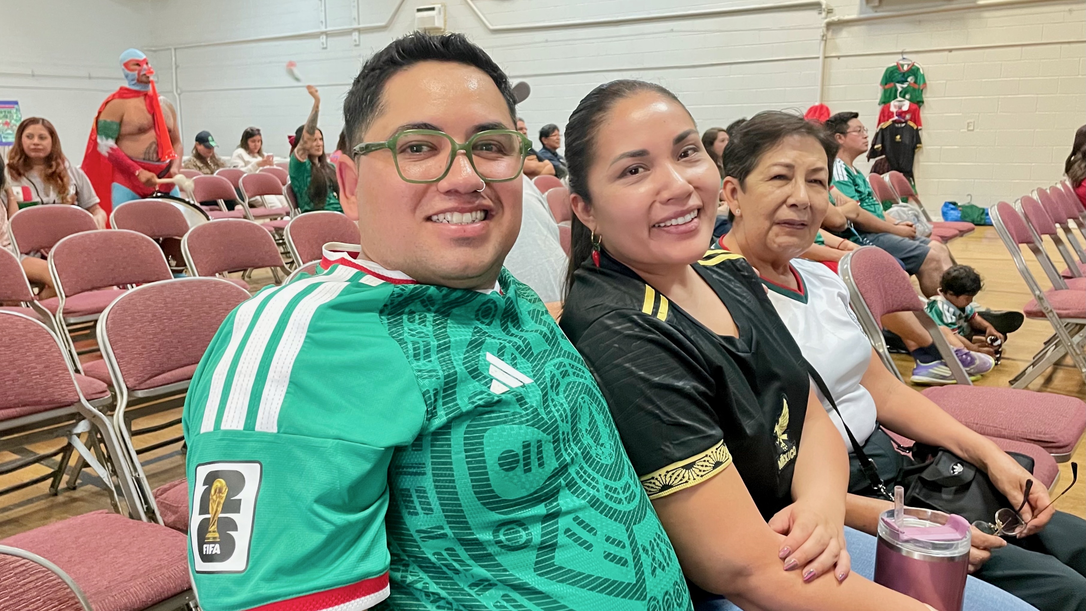 Many in Utah's Latino community are focused on the World Cup. From left, Carlos Becerra, Fernanda Gomez and Gloria Contreras at a watch party for the Mexican team on Wednesday at the Mexican Civic Center in Salt Lake City.