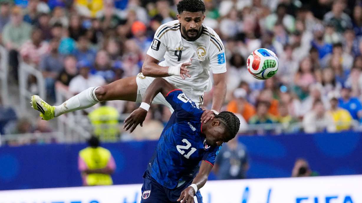 Saudi Arabia's Abdulelah Alamri (4) and Cape Verde's Nuno da Costa (21) collide was they try to head the ball during the second half of the World Cup Group H soccer match in Houston, Friday, June 26, 2026.