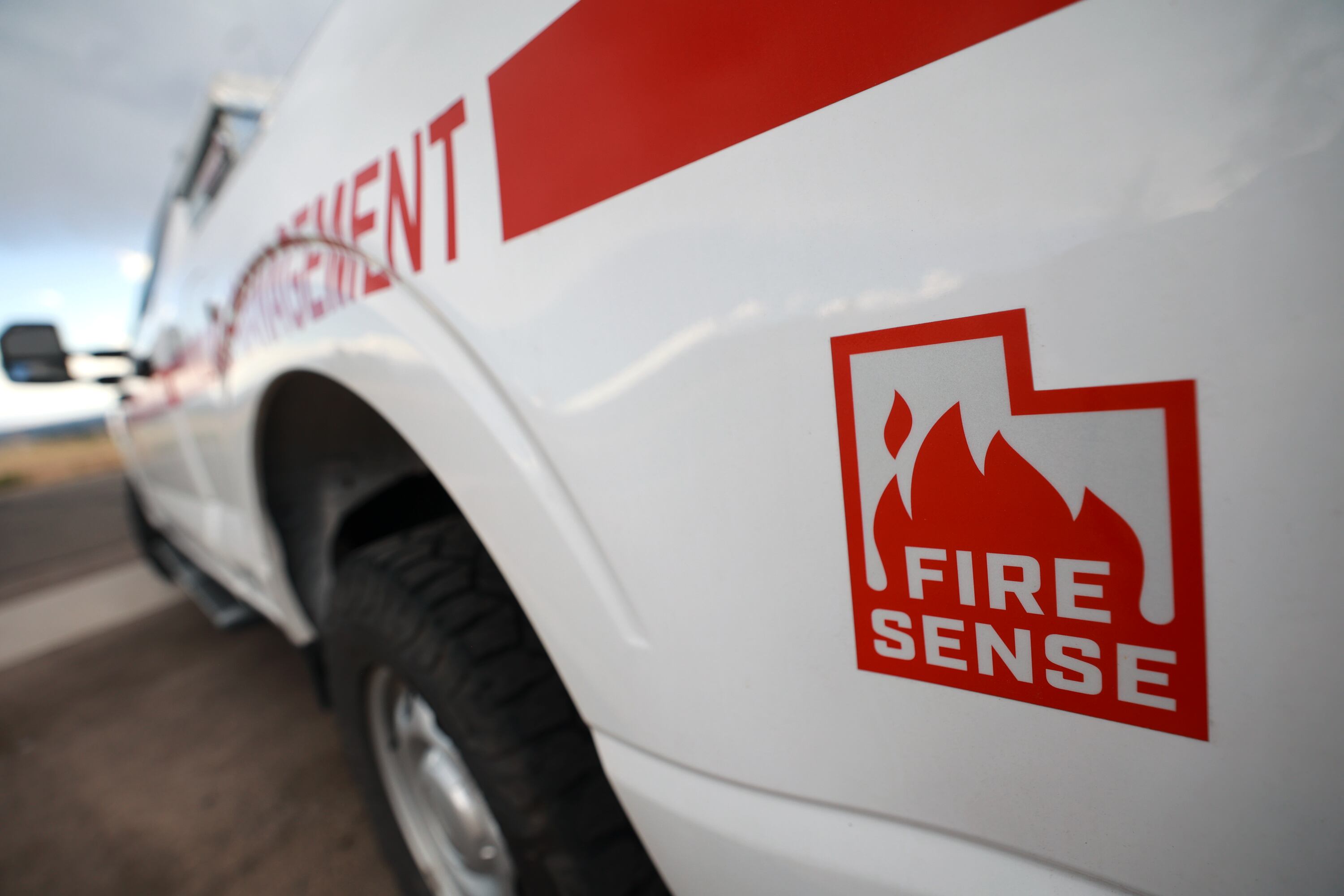 A Utah Department of Natural Resources Division of Forestry, Fire and State Lands vehicle is pictured at a press conference about current wildfire conditions near the Bonneville Fire burn scar in Salt Lake City on Thursday.