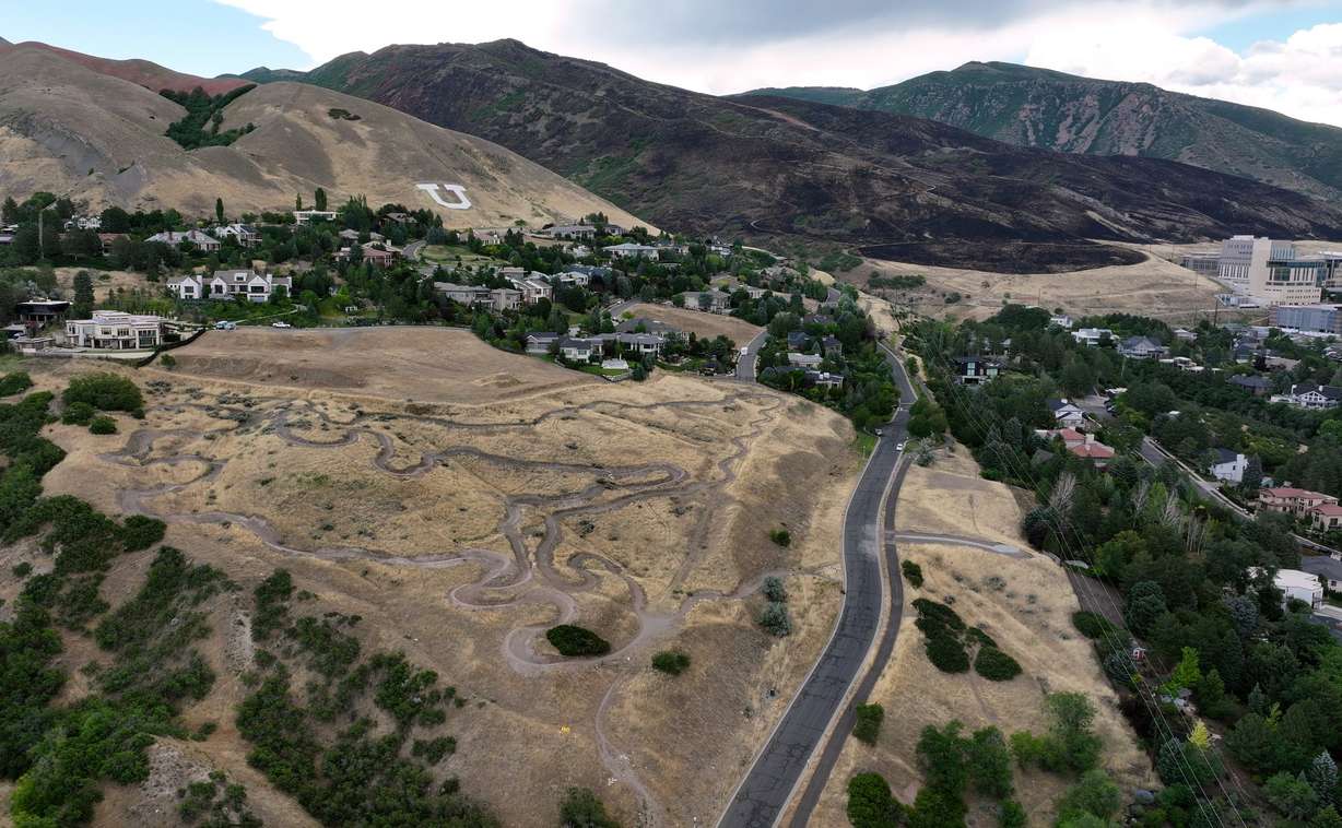 A parched hillside is pictured next to the Bonneville Fire burn scar in Salt Lake City on Thursday, June 25, 2026.