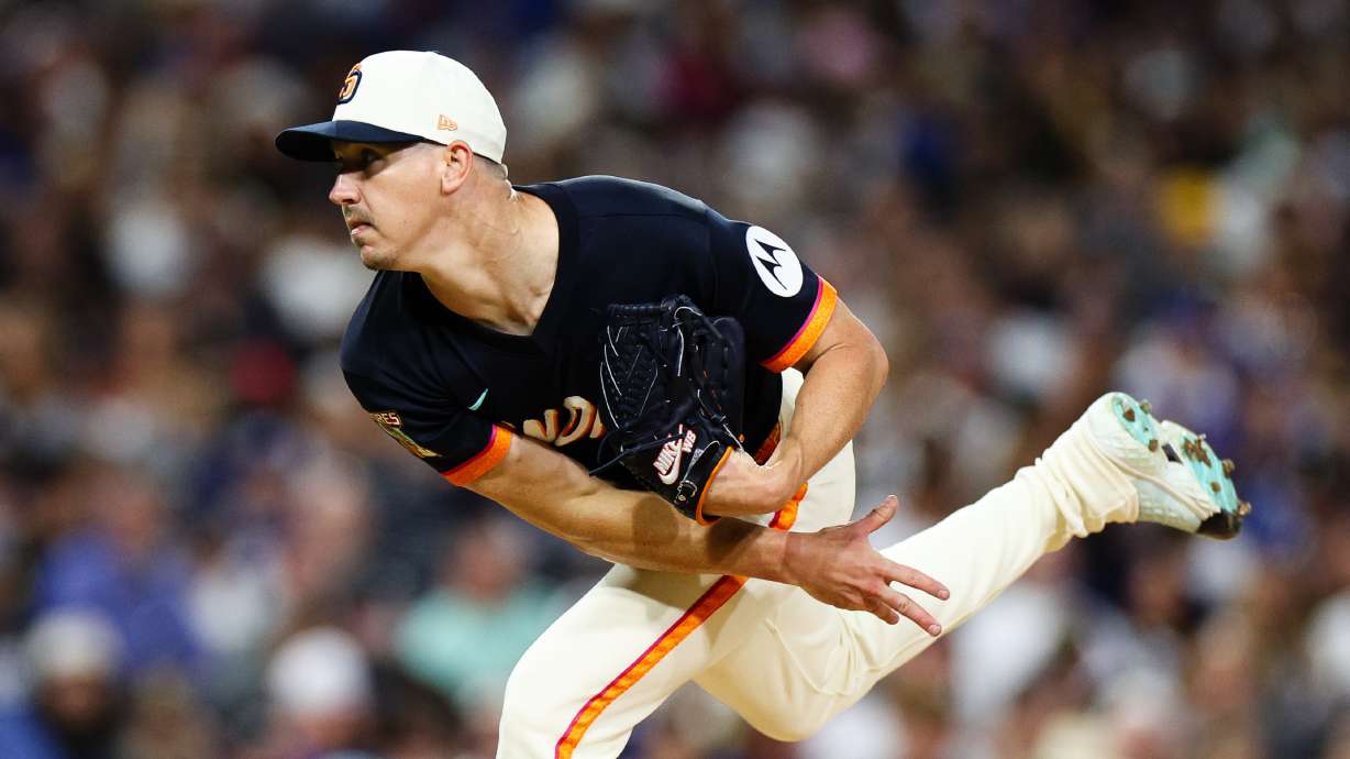 '"San Diego Padres' Walker Buehler follows through on a pitch against the Los Angeles Dodgers in the sixth inning of a baseball game Friday, June 26, 2026, in San Diego.