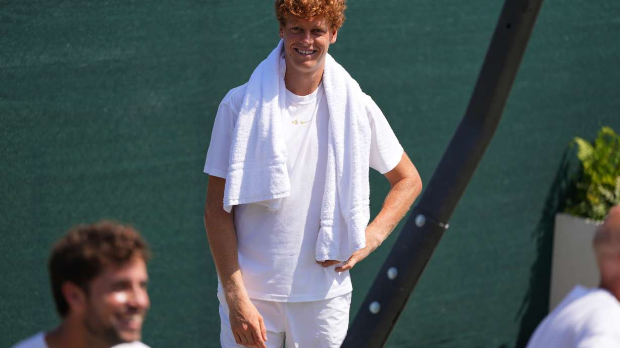 Jannik Sinner of Italy smiles during a training session at the All England Lawn Tennis and Croquet Club, ahead of the Wimbledon Championships in London, Thursday, June 25, 2026.