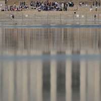 Former Olympian indicted on felony charge over alleged Reflecting Pool vandalism