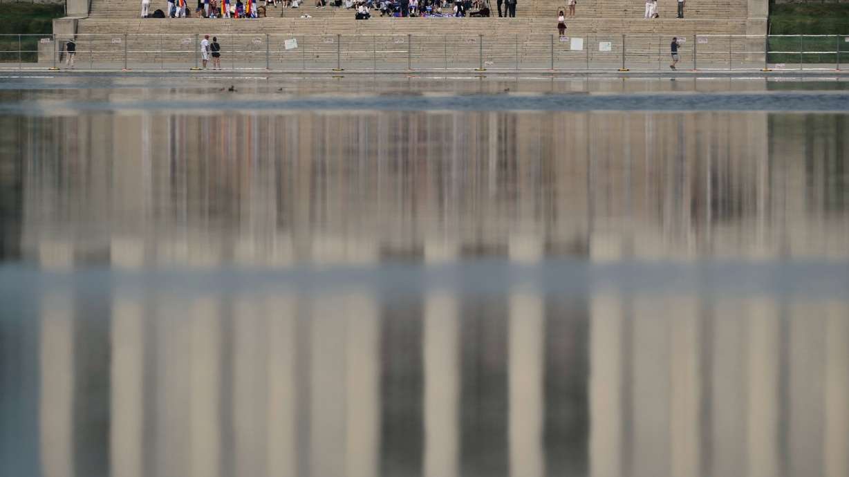 The Lincoln Memorial is reflected in the Reflecting Pool, Friday in Washington. A former Olympian was indicted on Thursday on a felony charge for alleged vandalism of the Lincoln Memorial Reflecting Pool.