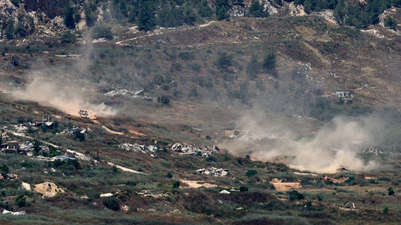 Israeli tanks maneuver in Lebanon, after Israel and Lebanon signed a framework agreement following U.S.-mediated talks, as seen from northern Israel, Saturday. Hezbollah's leader rejected the framework, calling it "null and void."