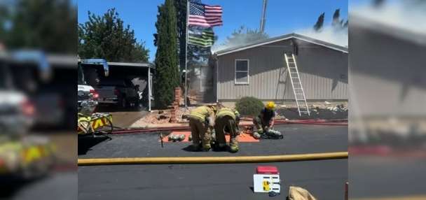 Firefighters respond to fire that spread to 5 homes