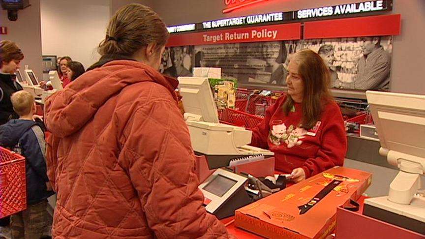 Shoppers trek back in stores and malls to return gifts